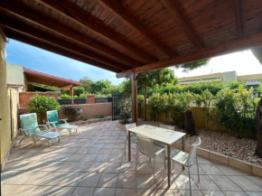 Villetta climatizzata con giardino e al mare Torre Dell'orso